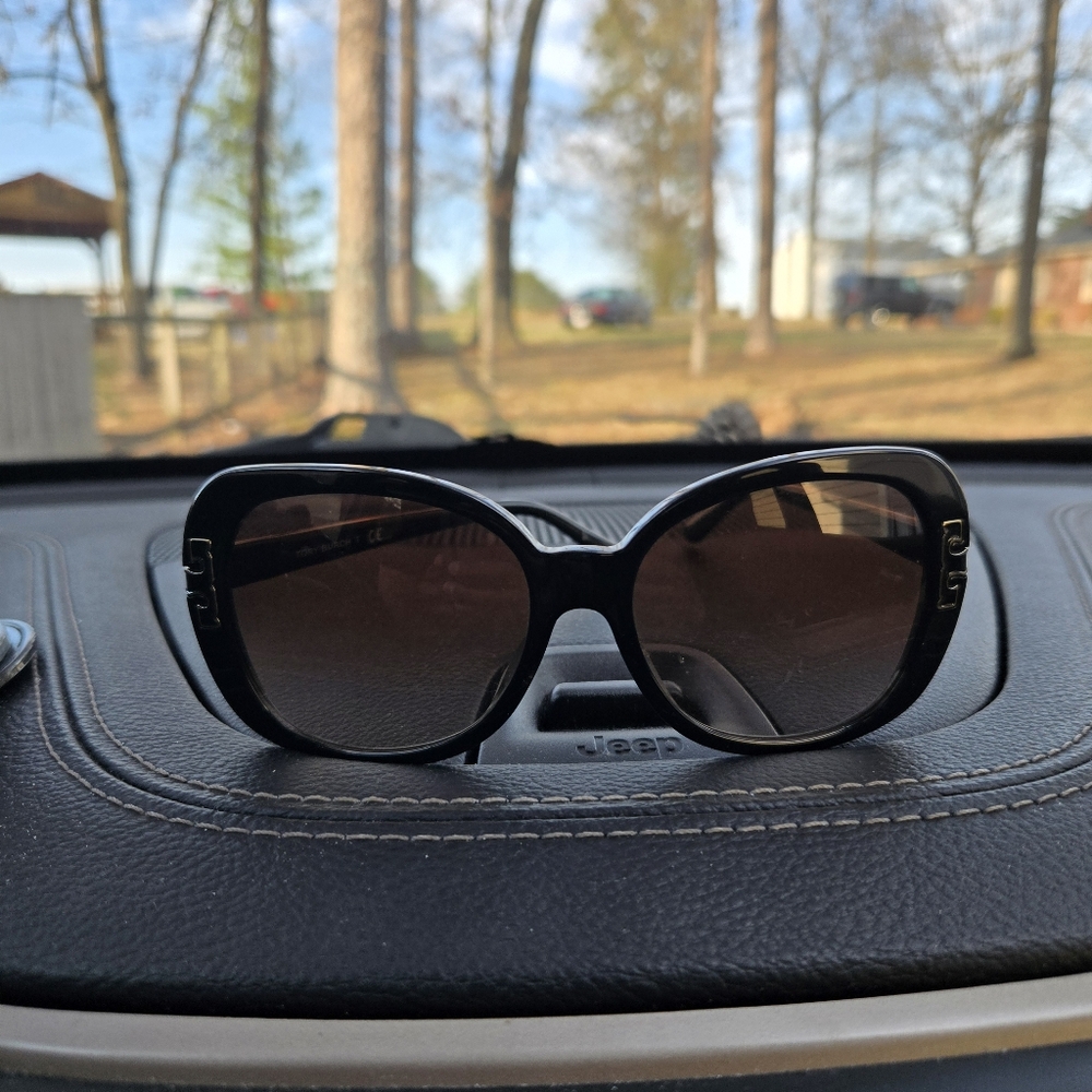 Oversized Black  Tory Burch Sunglasses with Rounded Lenses